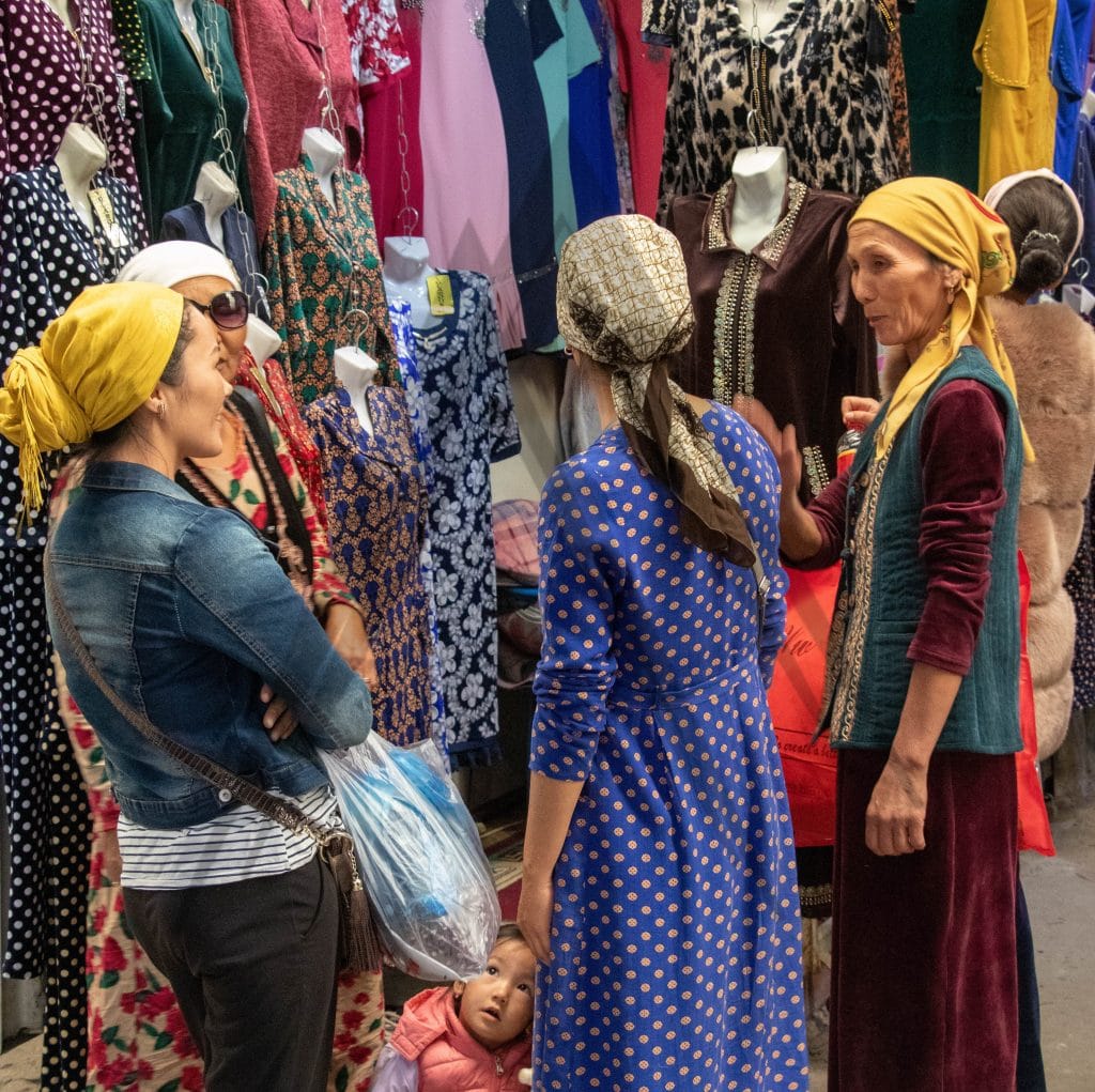 Dordoi bazar women with Kyrgyz dresses