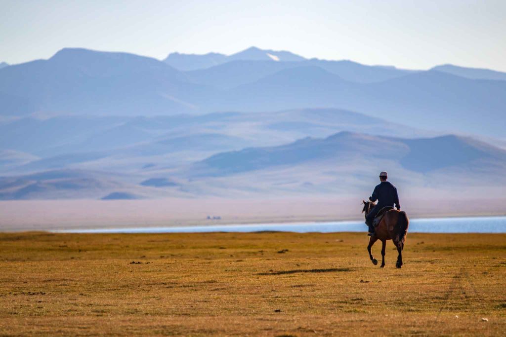 Son Kul horseback nomad jailoo in Son Kul, Kyrgyzstan, Central Asia