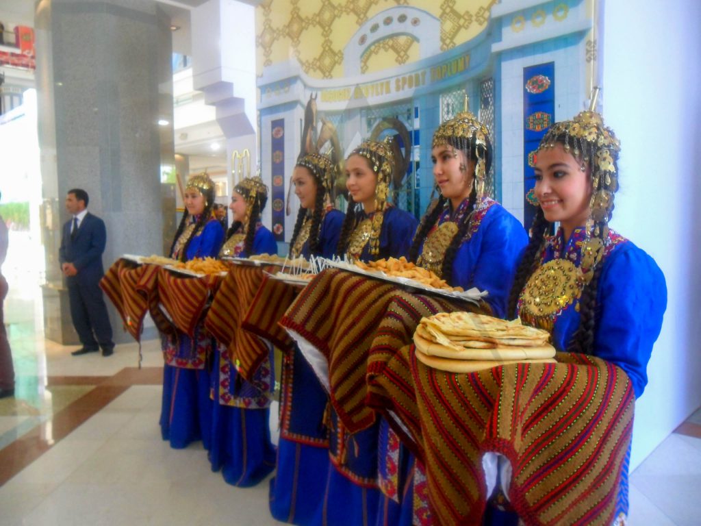 Turkmenistan bread carried by young girls