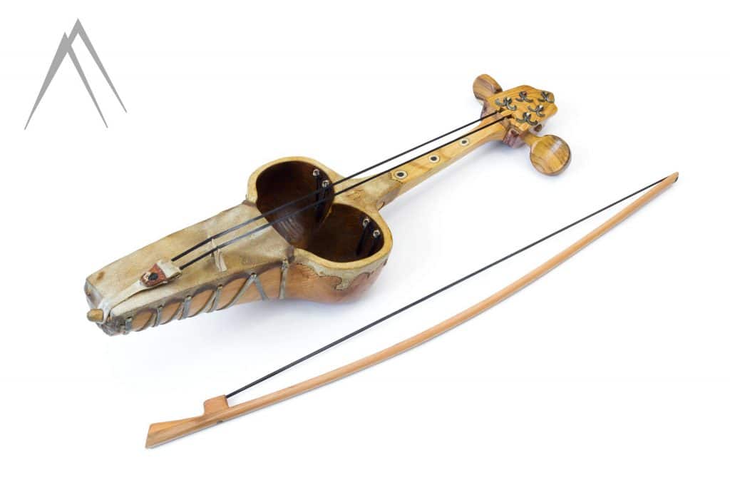 Kazakh national string instrument kyl-kobyz with bow isolated on white background