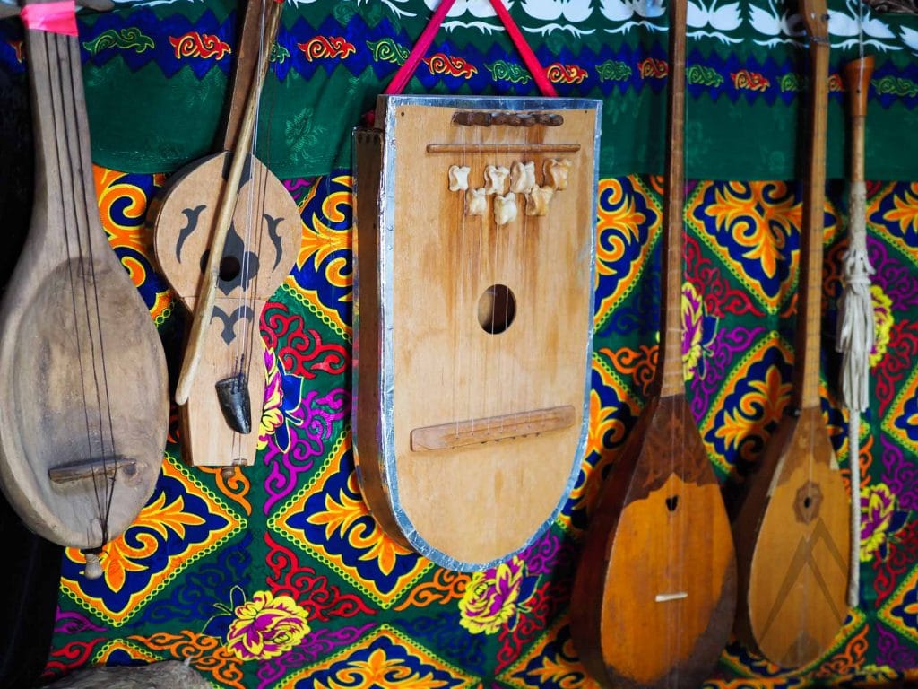 Dombra string instruments on the wall of Kazakh yurt.