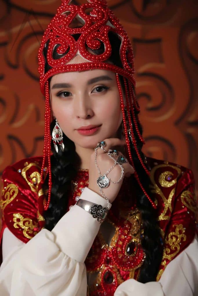 Kazakh national wedding dress. Ornaments and embroidery on fabri