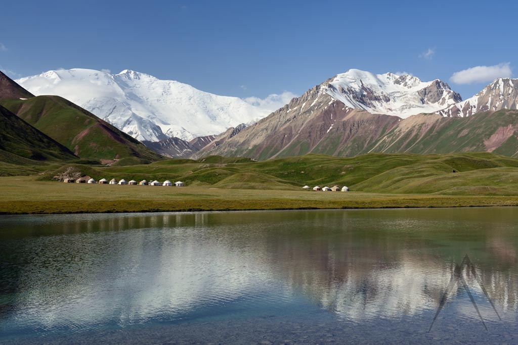 Tulpar Kol lake and yurt camp by the Lenin peak in Alay valley