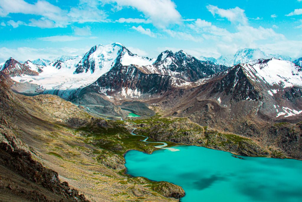 Lake Ala Kul in Kyrgyzstan with the river flowing in