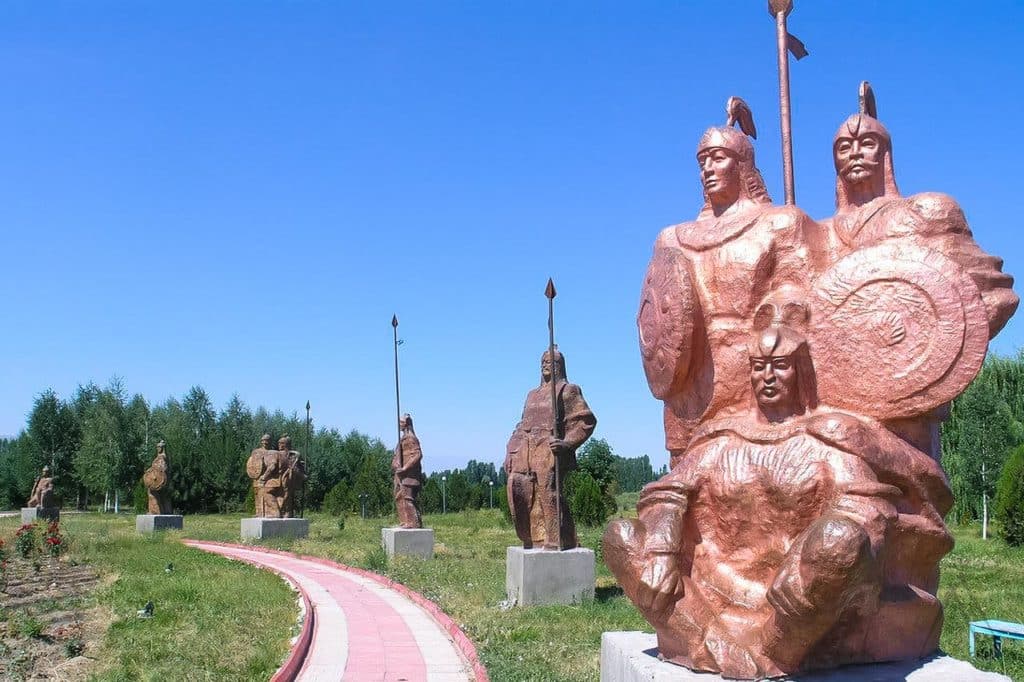 Manas companions surrounding his statue in Manas Ordo in Talas
