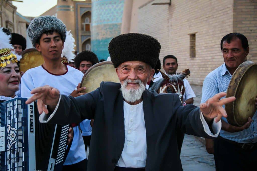 Old man dancing traditional Uzbek dance