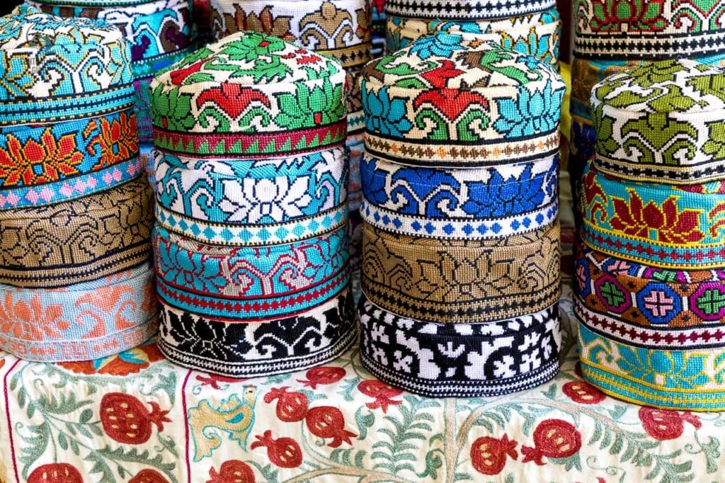 The traditional Uzbek cap named tubeteika, decorated with multi colored embroidery. Bukhara, Uzbekistan, Central Asia