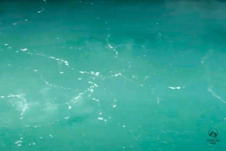 Gas bubbles in water hole of Darvaza