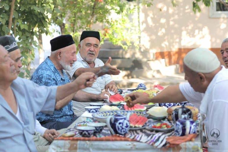 Uzbek table with uzbek dishes, tea and watermelon