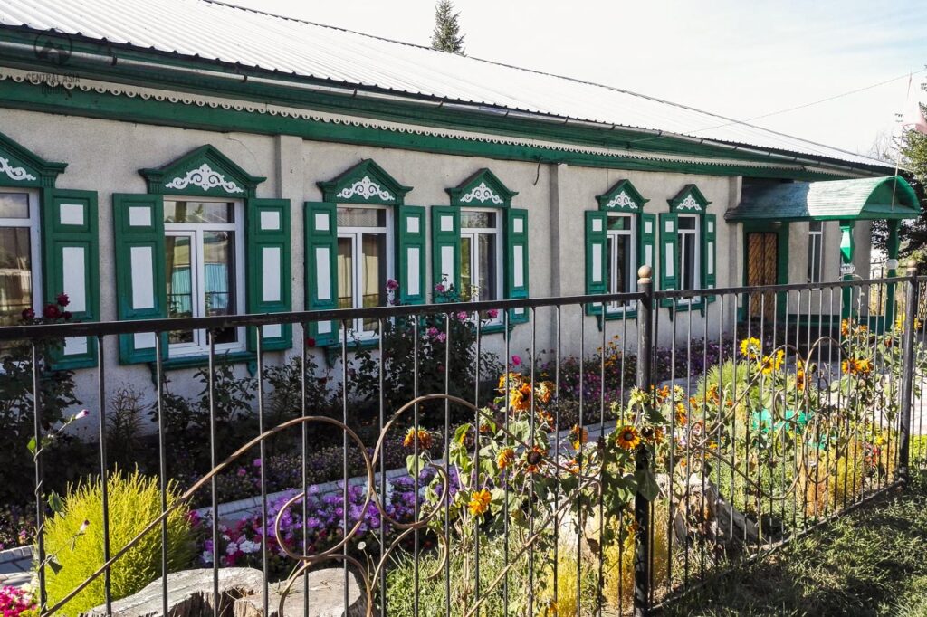 Russian stule wooden "gingerbread" house in Karakol