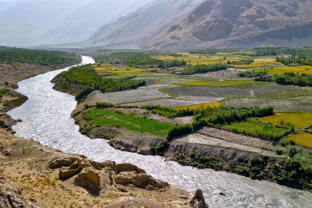 Afghan fields beyond the Pyanj river in Wakhan Valley