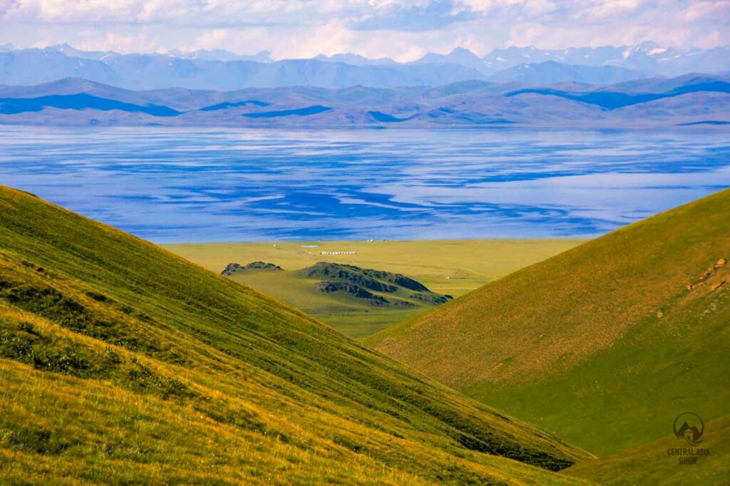 Son Kul and yurt village from afar hills.