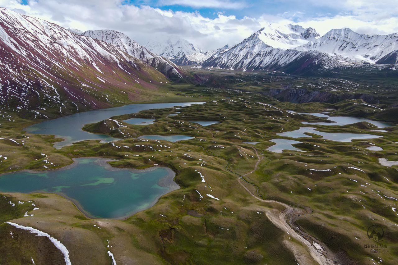 Tulpar kul lakes and snowy Lenin peak mountains