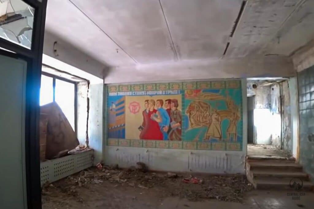 Murals inside an abandoned building in Mailuu Suu