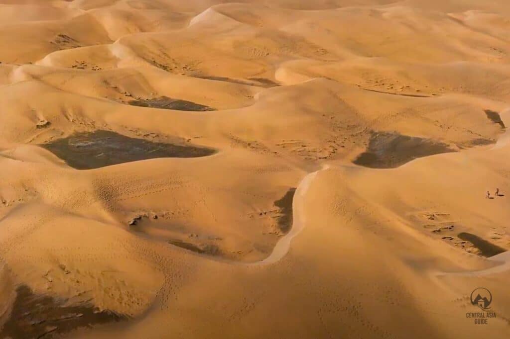 Black soil under the sands of karakum desert