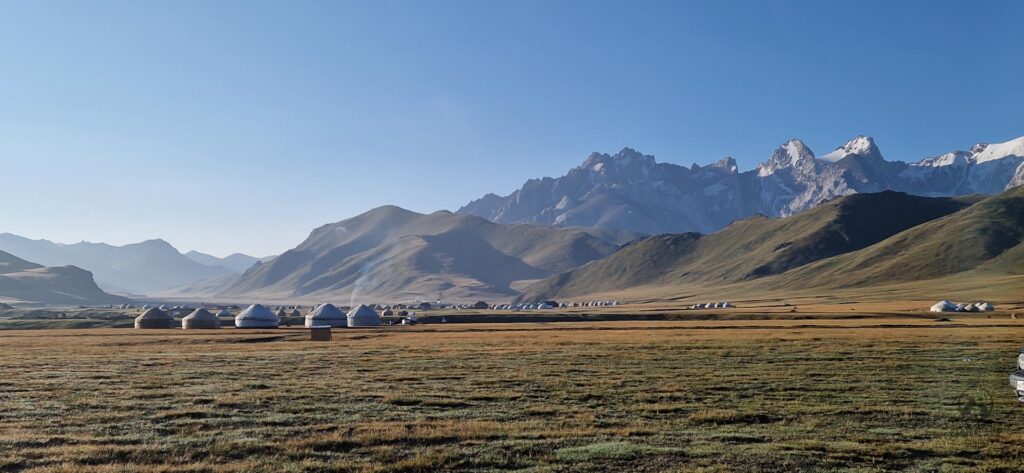 Kok Kiya valley yurt villages next to river and Kel Suu