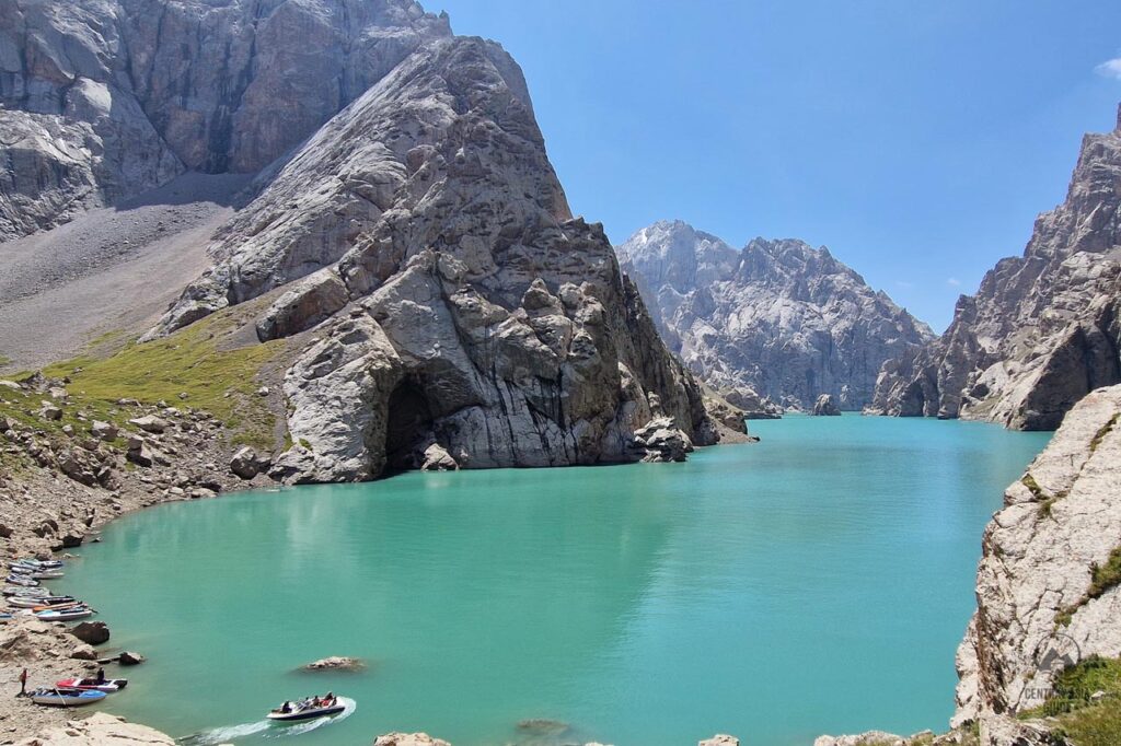 Boats at the shore of Kel Suu lake in Southern Kyrgyzstan