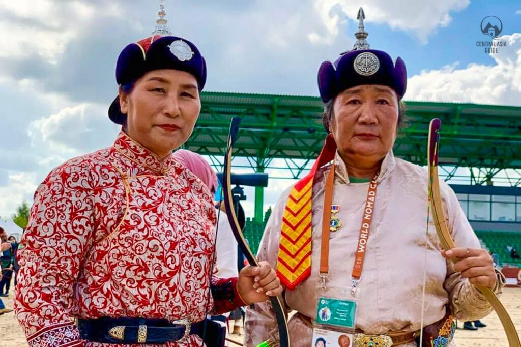 Nomad games participants with bows