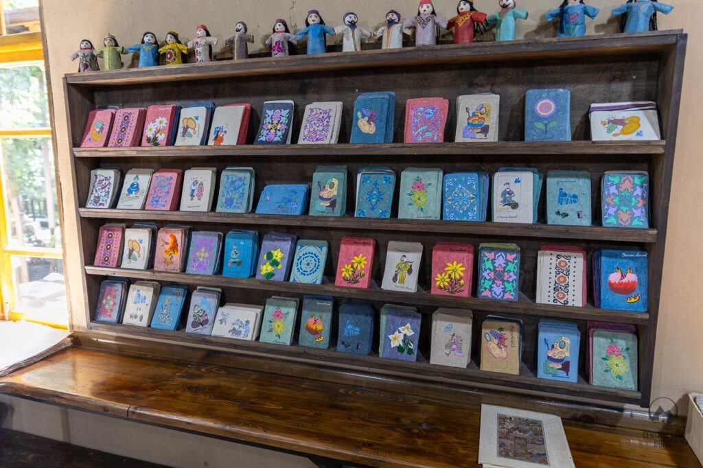 Post cards and puppets made from Samarkand paper in the paper factory shop