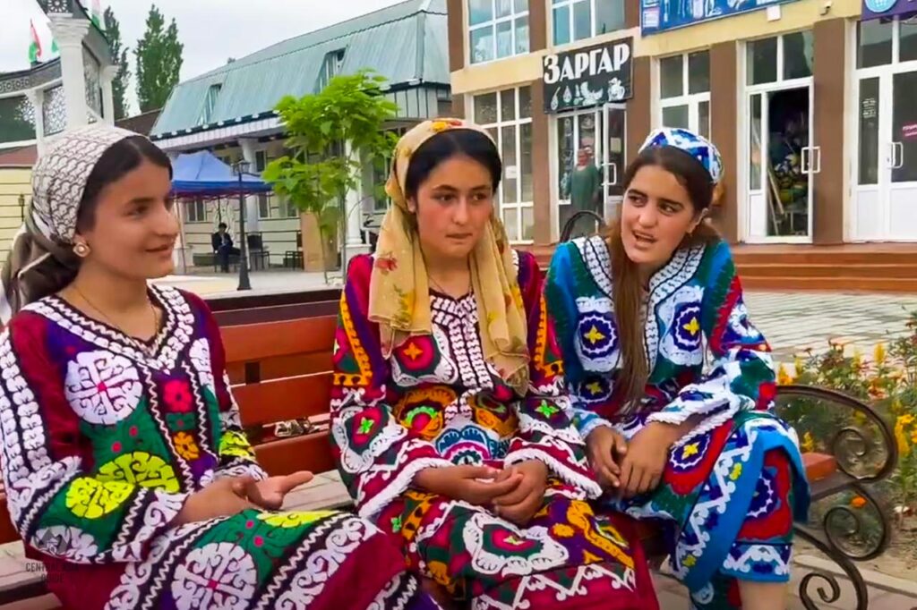 Tajik handicraft Chakan dress worn by three Tajik girls